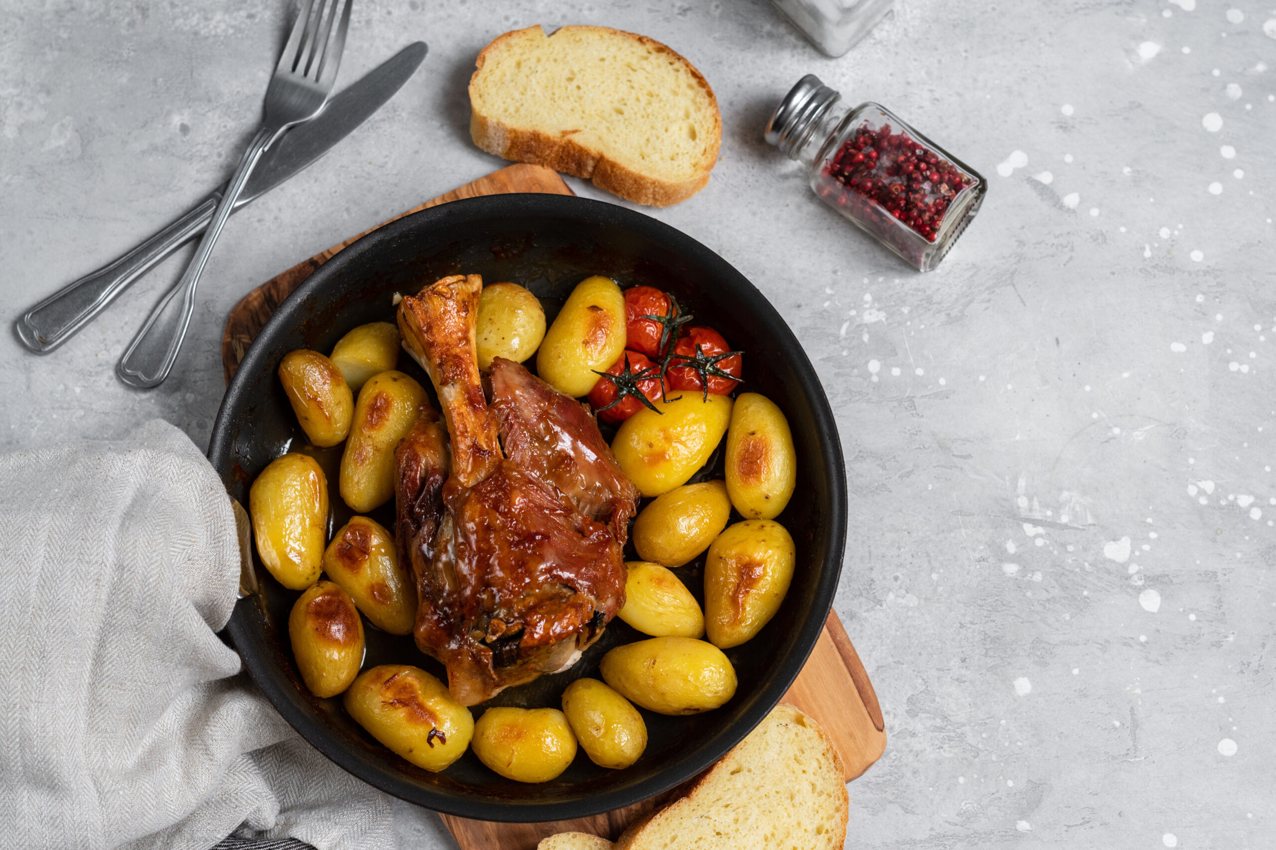 Home made family lunch or dinner Roasted pork shank with potatoes homemade lunch meat recipe